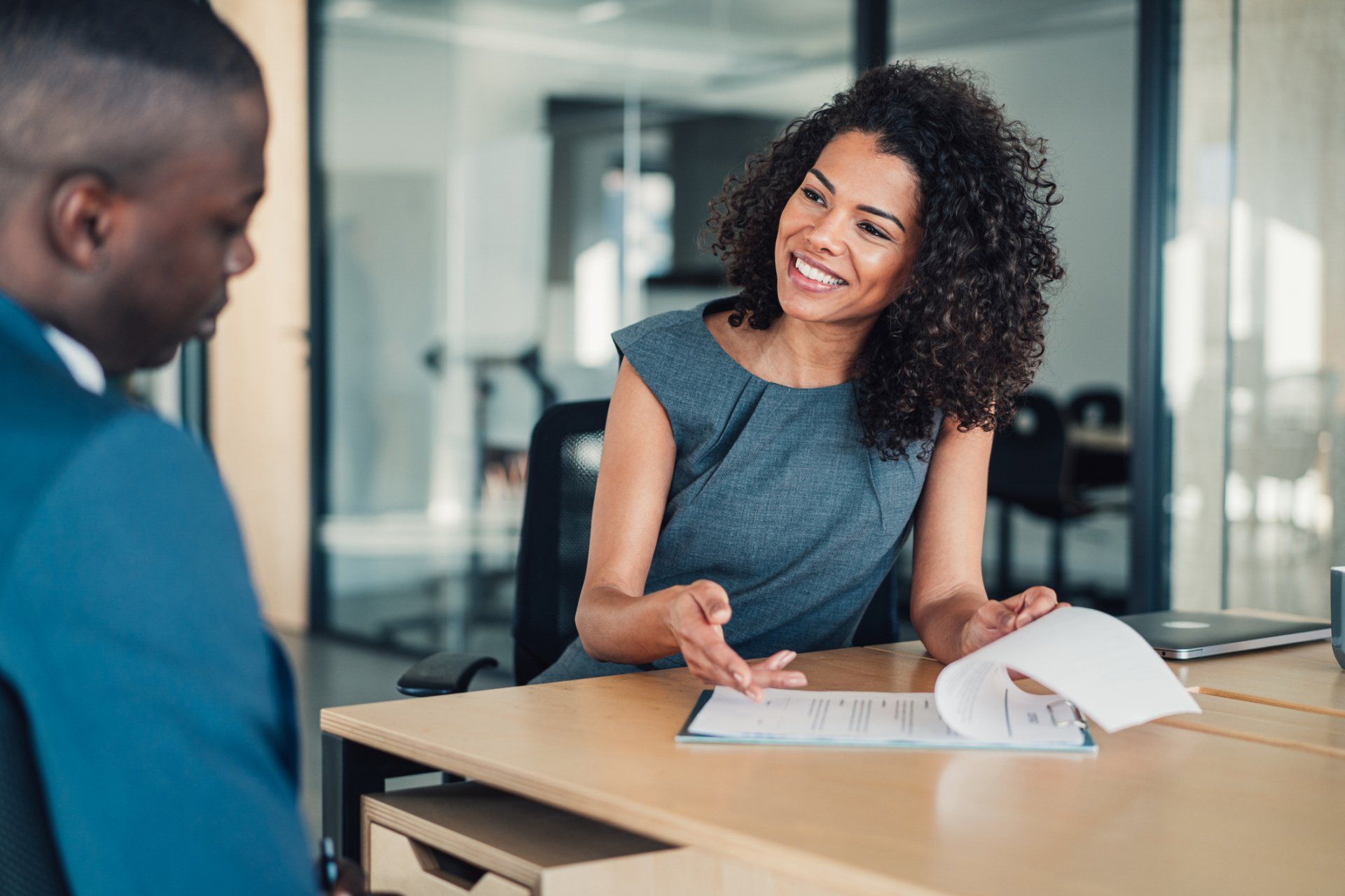 Attorney meeting at a desk — Grapevine, TX — Silvas Law, PC